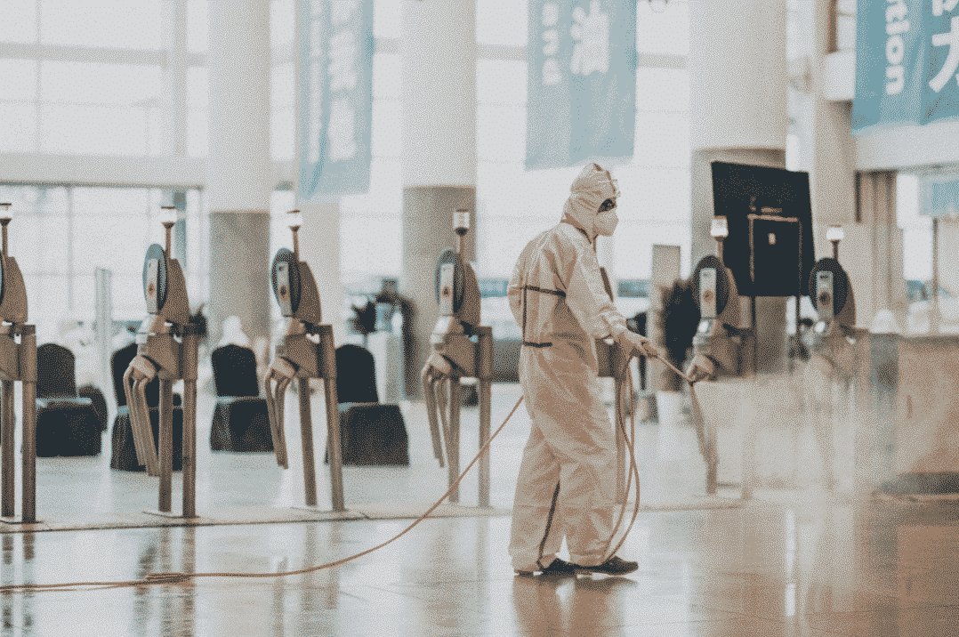 Personnel cleaning a facility